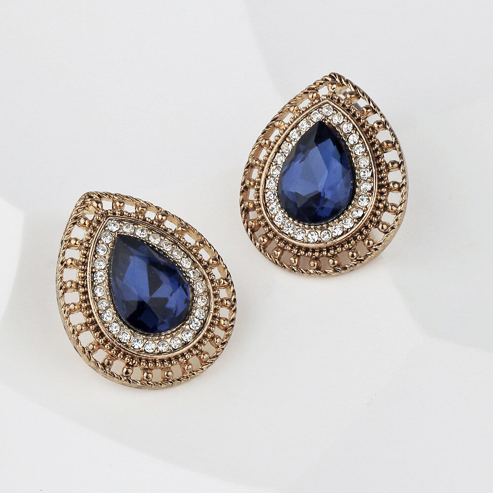 brown and blue earring