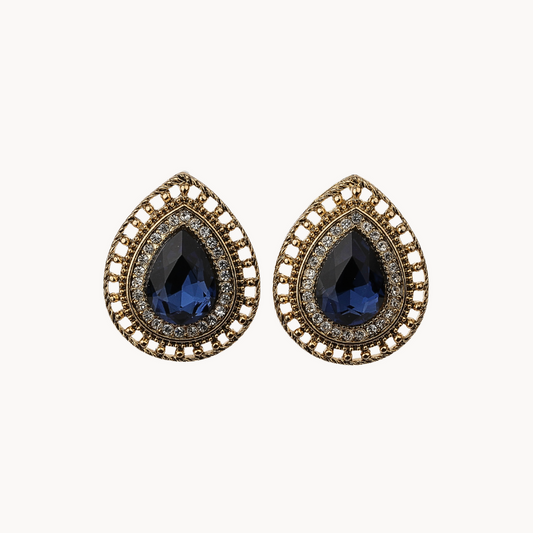 brown and blue earring